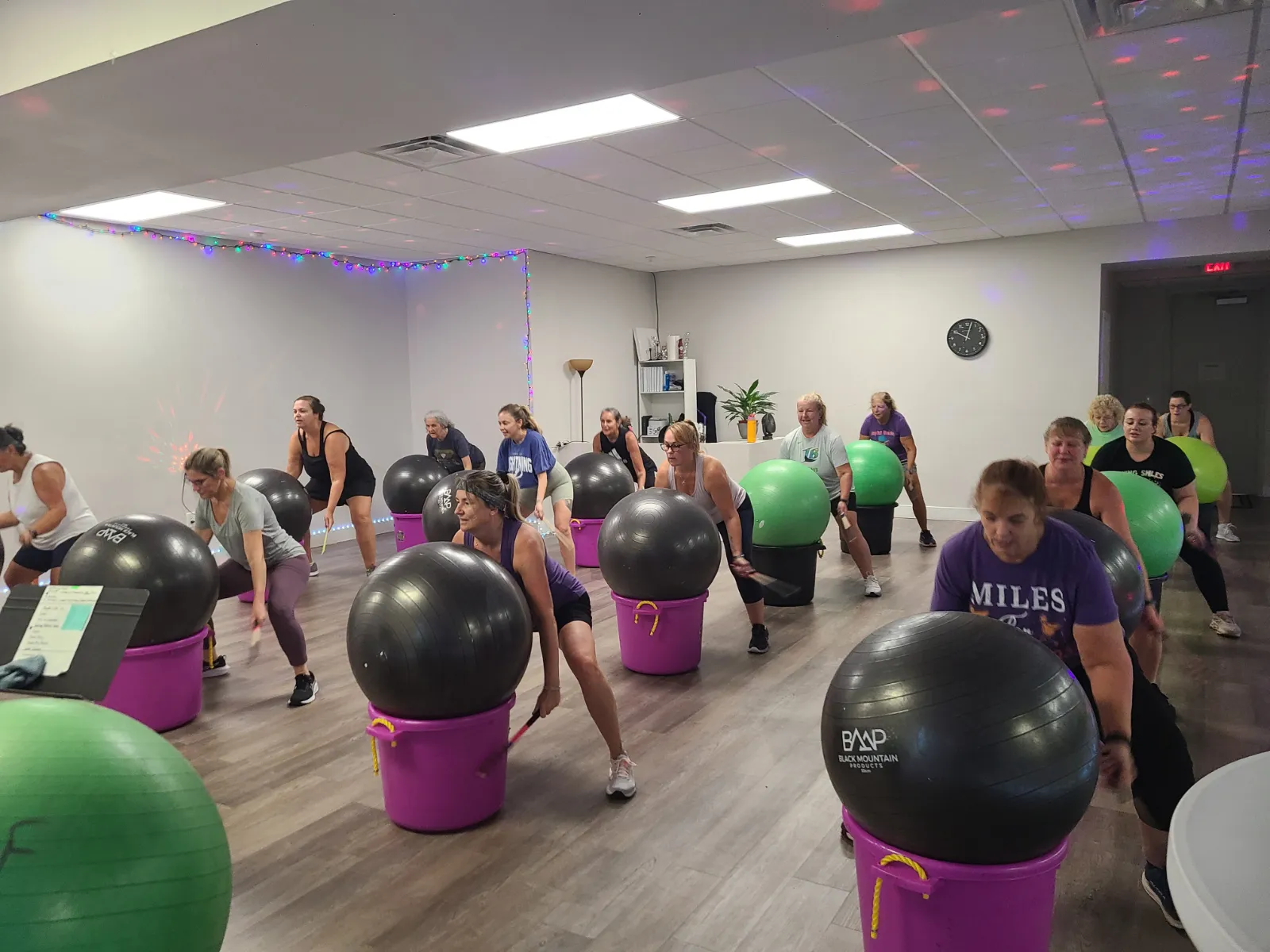 Inside the Joyful Beats studio with party lights on